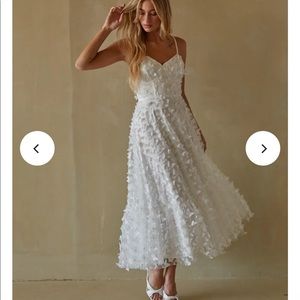 Beautiful white butterfly lace up dress